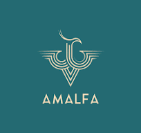 Desk with leather desk pad, walnut desk organizer, wireless keyboard and mouse, and porcelain mug.