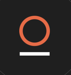 Desk with leather desk pad, walnut desk organizer, wireless keyboard and mouse, and porcelain mug.