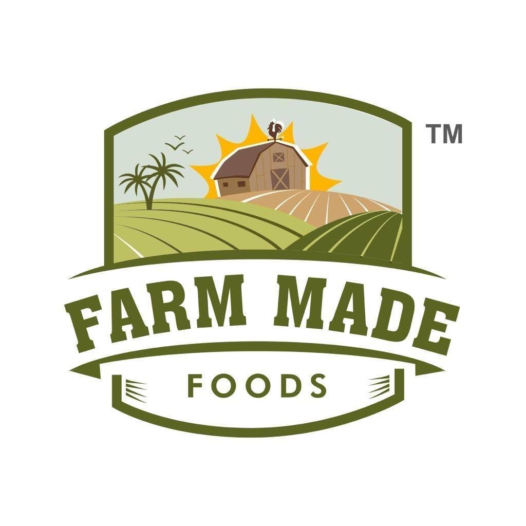 Desk with leather desk pad, walnut desk organizer, wireless keyboard and mouse, and porcelain mug.