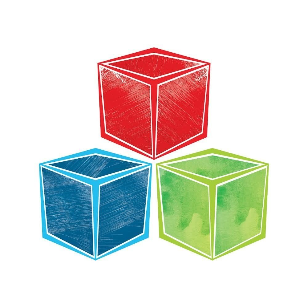 Desk with leather desk pad, walnut desk organizer, wireless keyboard and mouse, and porcelain mug.